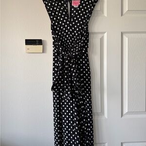 Never worn like brand new Black and White Polka Dot jumpsuit